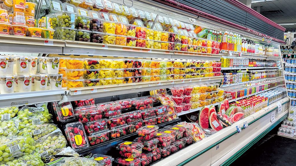 At the Super Foodtown in the Bronx, there is a demand for fresh cuts and other convenience items. The fresh-cut assortment ranges broadly, from broccoli to watermelon.