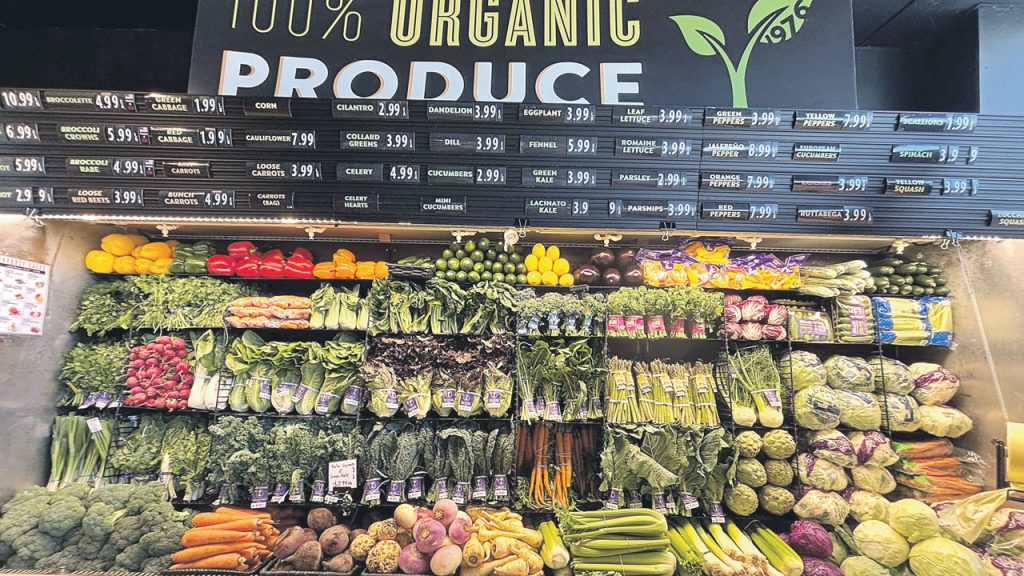 Assisting stores at point-of-sale with merchandising, promotion or ad planning is also an important service that distributors and importers offer retailers. This photo shows the work of Four Seasons Produce, Ephrata, PA, in the Rising Tide Natural Market, Glen Cove, NY.