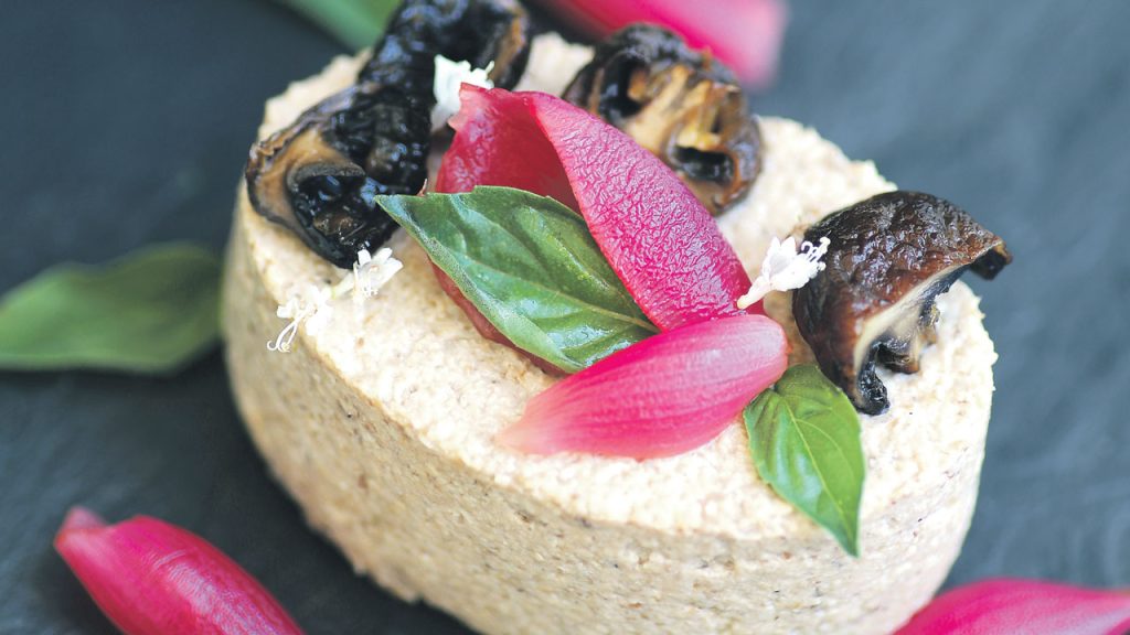 Mushrooms on the menu are showing up in a variety of ways, like this mushroom pate with pickled onions.