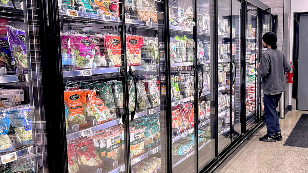 Salads, veggies, and fresh cuts predominated the cold case at the Amazon Fresh store in Bailey’s Crossroads, VA. The case housed both bagged and clamshell salads, as well as cut fruit and vegetables.