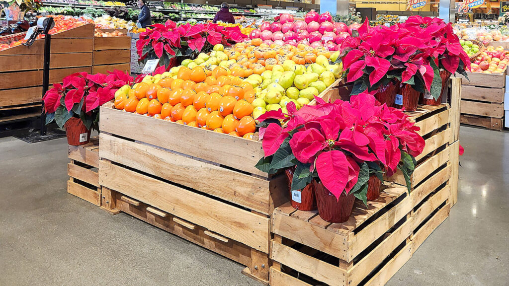 Colorful citrus displays draw attention during the winter, with retailers using high-traffic areas to promote wellness.