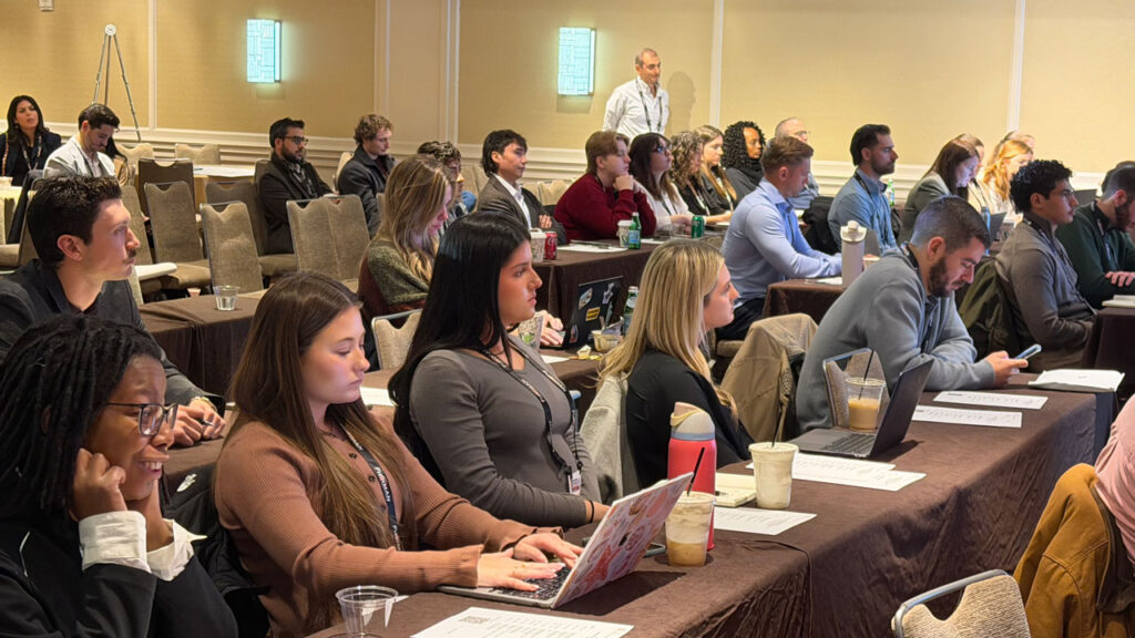 A packed room of attendees at the Foundational Excellence Program.