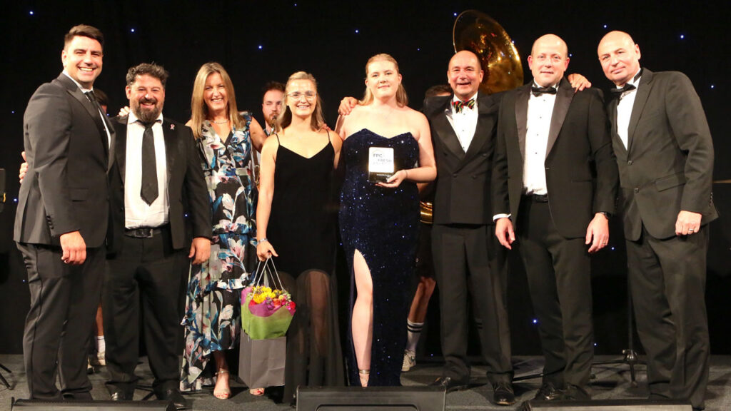 Fyffes' Imogen Christmas (center, with award); Toni Direito; Lucy Mitchell; Roger Crudge; John Hopkins; and fellow Fyffes colleagues, pictured receiving the Ethical Sustainability Excellence 2025 award at the annual FPC Fresh Awards gala ceremony held in London.