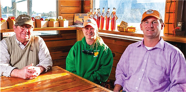 Black’s Peaches owners Arthur Q. Black, Beth Black White and Christopher Black