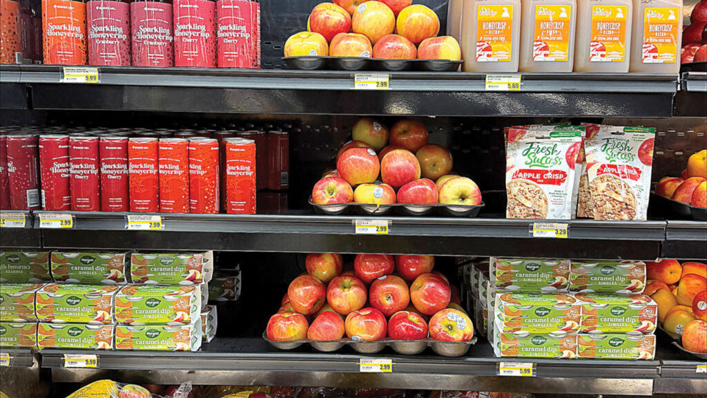 A curated blend of bulk, bagged and related apple items make a display that encourages multiple purchases.